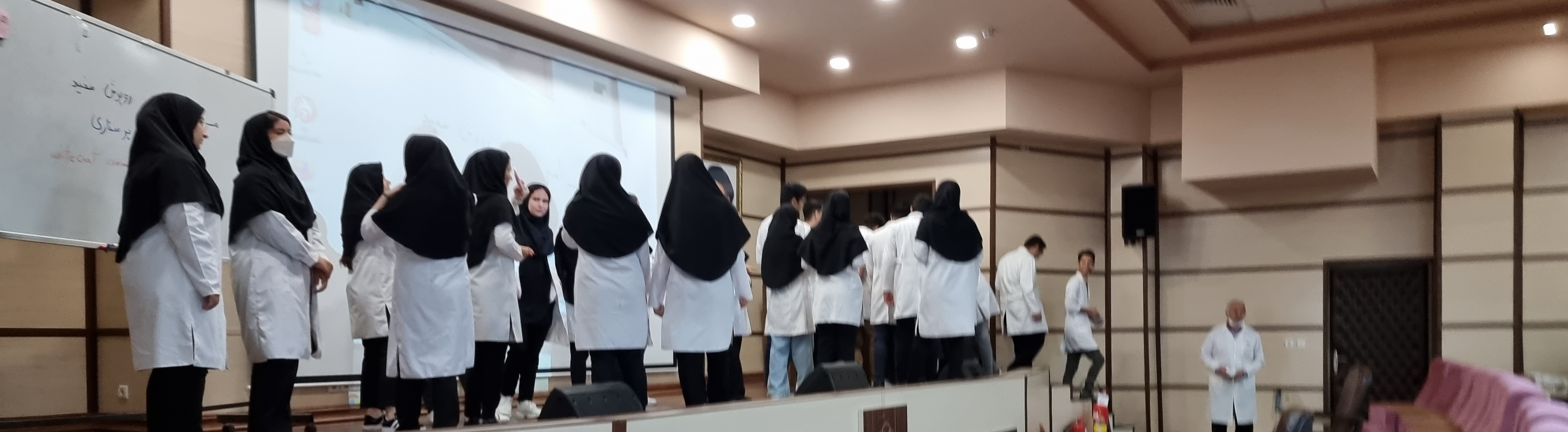 The white coat ceremony   مراسم نمادین روپوش سفید برای دانشجویان ترم ۲ پرستاری  white coat ceremony