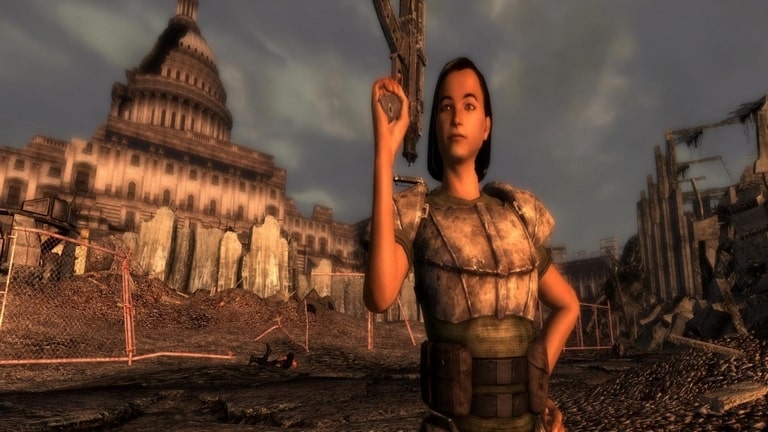 بهترین مادهای Fallout 3 شخصیت زن ژست گرفته با تفنگ در دست