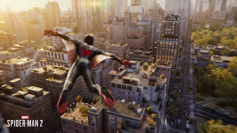 Marvel's Spider-Man 2، اسپایدرمن 2 پلی استیشن 5 در حال پرواز با وینگ سویت بالای شهر بررسی بازی مرد عنکبوتی 2